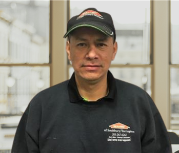 man with servpro hat and shirt