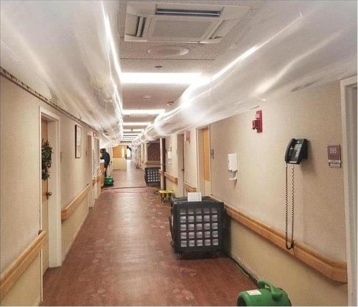 hallway of a hospital with water damage